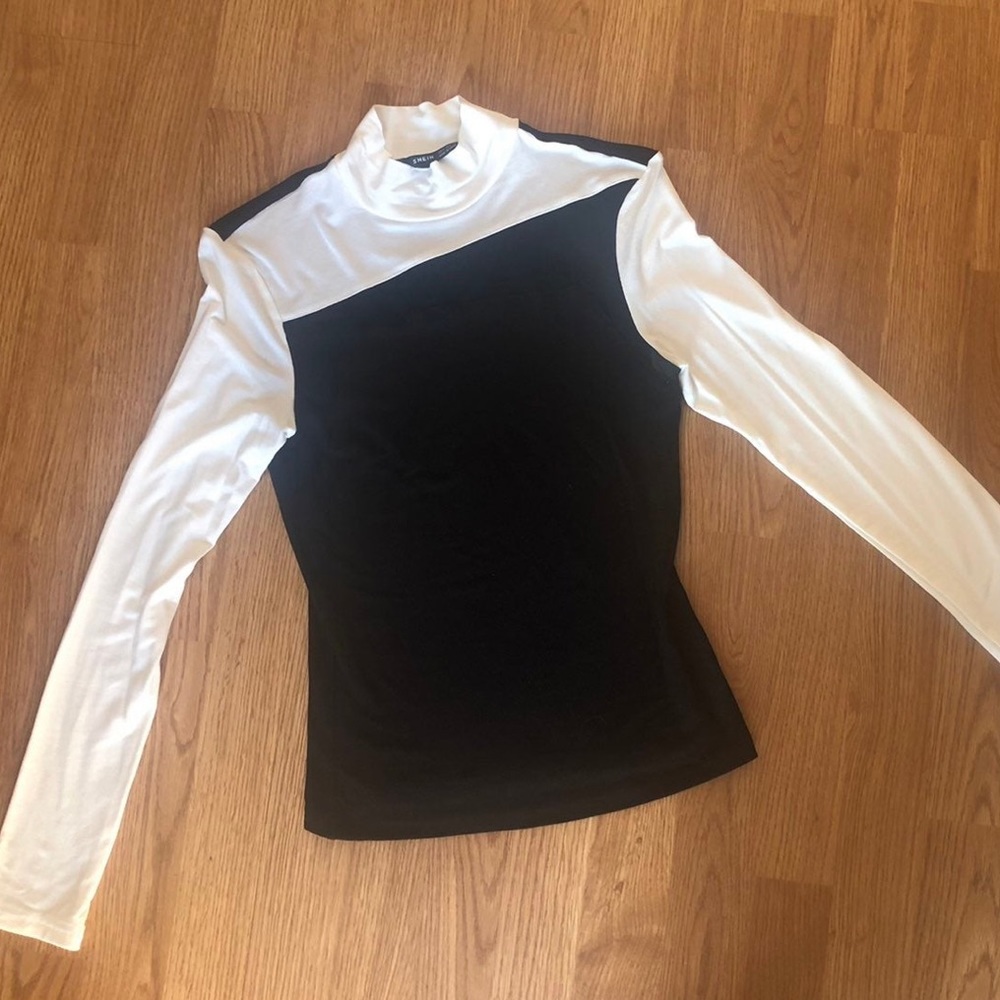 White and black asymmetrical long sleeve top